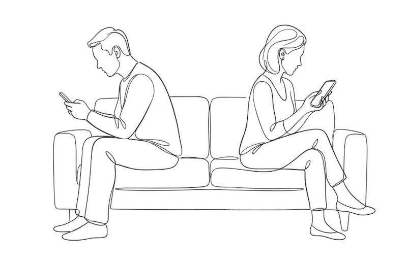 Couple on sofa both on phones